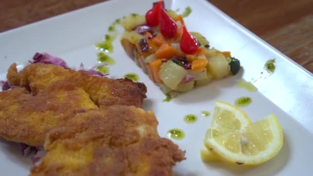 Milanese steak and pickled vegetables — Stock Video