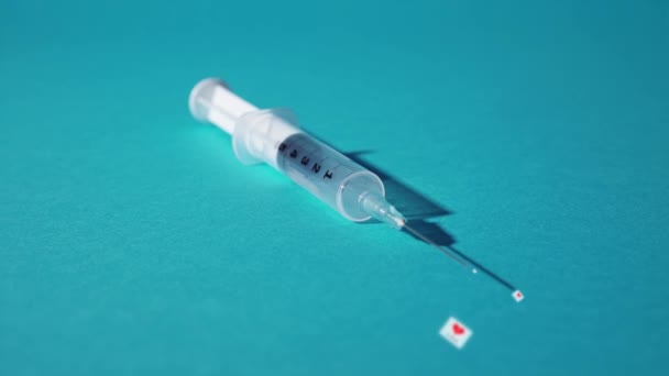 Syringe expels little hearts with written like — Stock Video