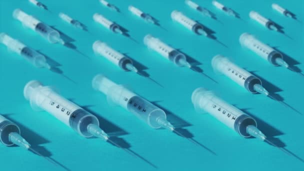 Many syringes move on a green background — Stockvideo