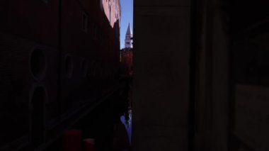 San Marco tower in the middle of a dark canal