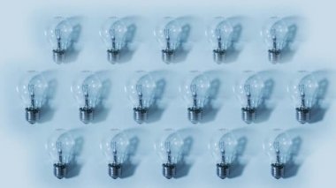 Light bulbs light up on white background