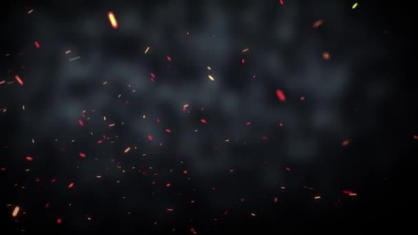 Гарячі частинки літають на темному тлі — стокове відео
