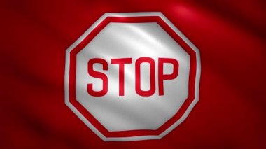 Kırmızı bayrağın üzerindeki dur işareti rüzgarda yavaşça hareket ediyor.