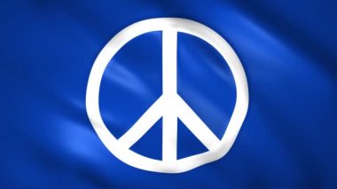 Mavi bayrağın üzerindeki barış sembolü rüzgarda hareket ediyor