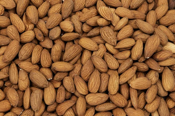 Heap Raw Almond Nuts Background — Stock Photo, Image