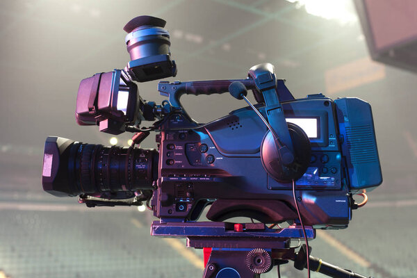 tv camera in a concert hal. Professional digital video camera.