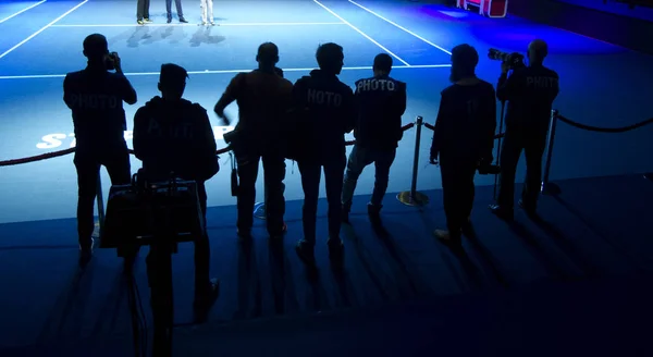 Fotografer på tennisbanan — Stockfoto