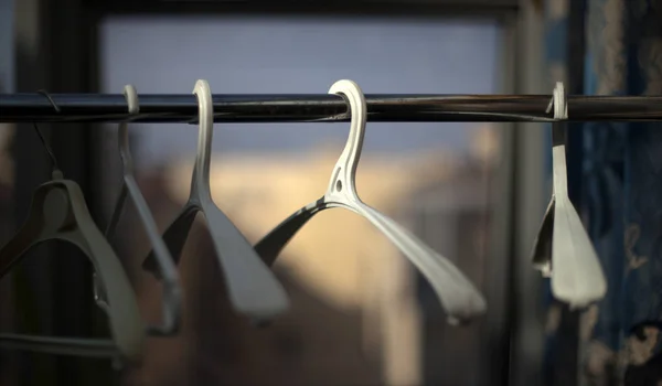 Numbered wardrobe coat hangers. — Stock Photo, Image