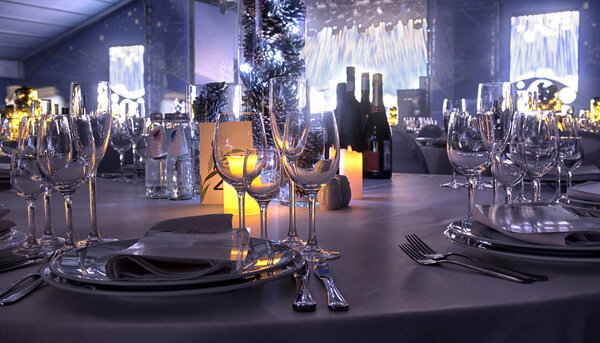 Christmas And New Year Holiday Table Setting with Champagne.