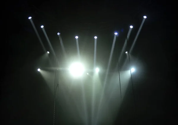 Bright beautiful rays of light on an stage before the concert. — Stockfoto