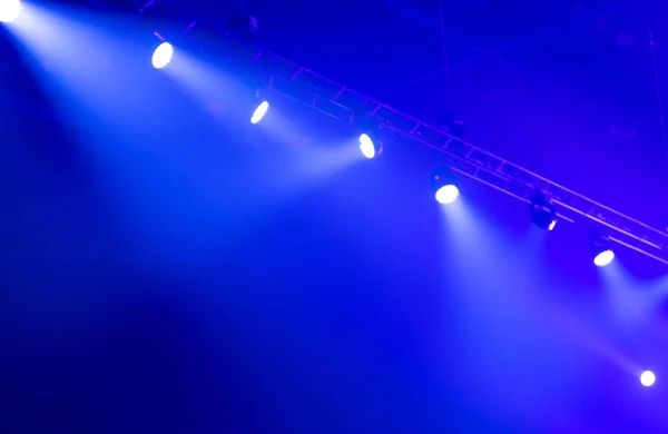 Bright beautiful rays of light on an stage before the concert.