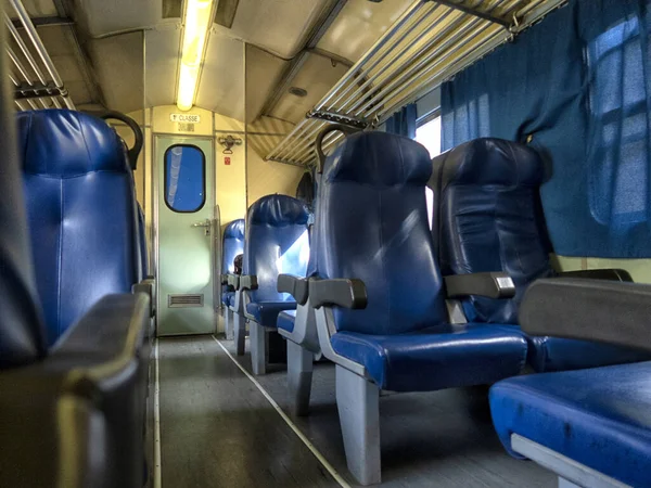 View inside the carriage of a passenger train on the railway. Railway transport.