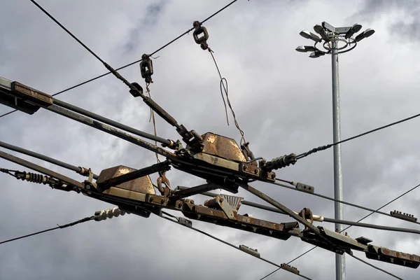 Trolleybus wires against the blue sky. close up. — Stock Photo, Image