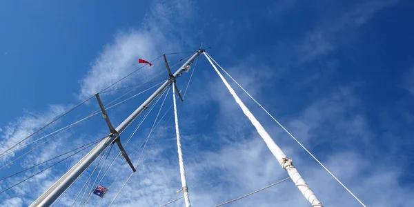 A beautiful sky cloudscape scene, over a yacht mast and rigging — 스톡 사진