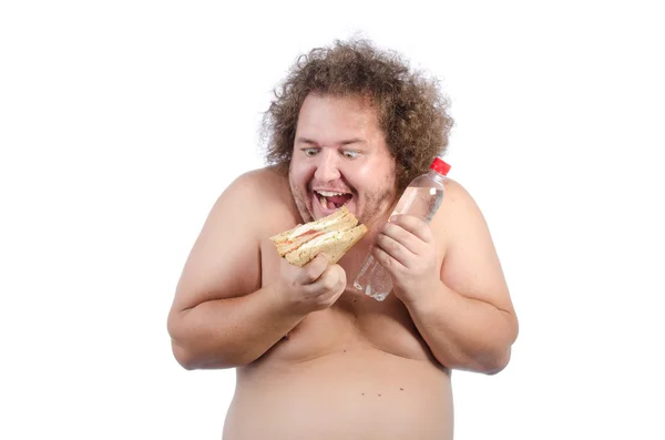 Tipo gordo hambriento con un sándwich . — Foto de Stock