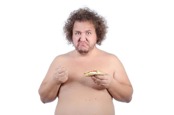 Tipo gordo hambriento con un sándwich . — Foto de Stock