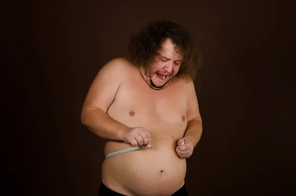 胖男人和一个大肚皮. — 图库照片