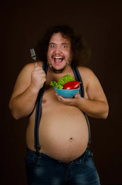 Ernährung. Dicke Kerle und Gemüse. — Stockfoto