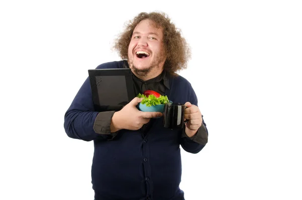 Ragazzo divertente con un'insalata e una tavoletta . — Foto Stock