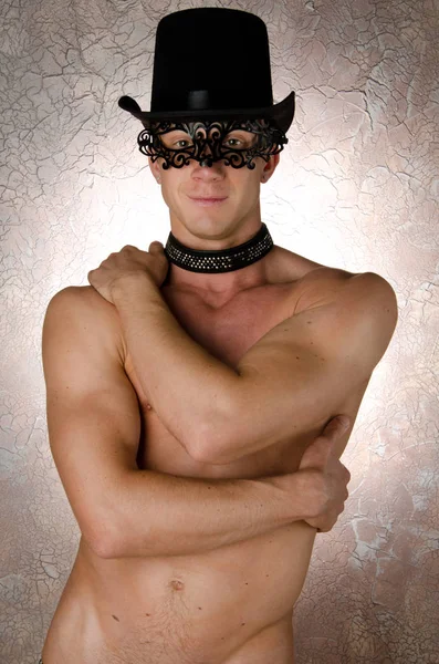 Καρναβάλι. Σέξι άντρας σε μια μάσκα. — Φωτογραφία Αρχείου