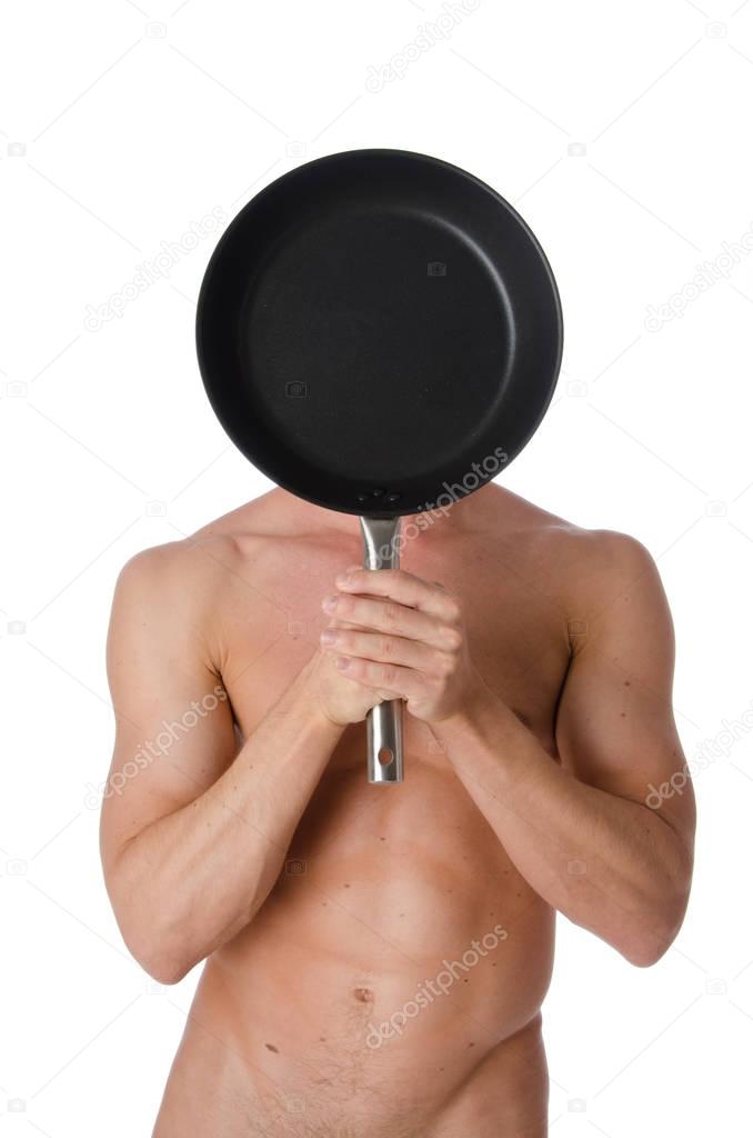 Sexy cook shirtless. Pan and body.