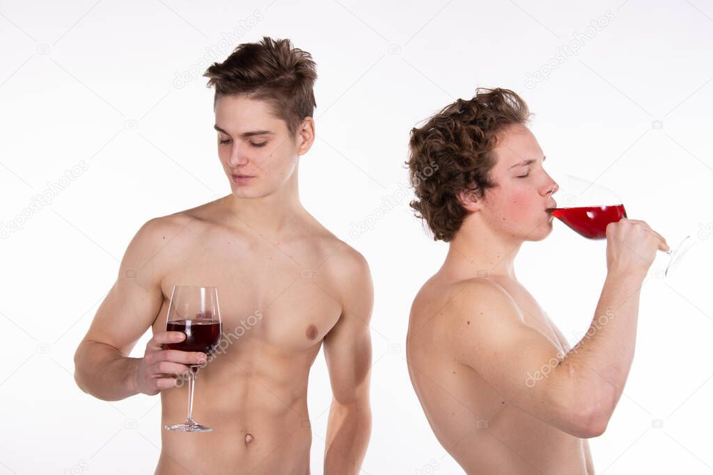 Two attractive guys and red wine.