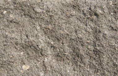 Gri beton arka plan. Duvarın arka planında çatlak var. Gri beton