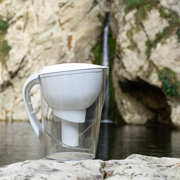 Water filter pitcher as a way to purify water for drinking or use for cooking.