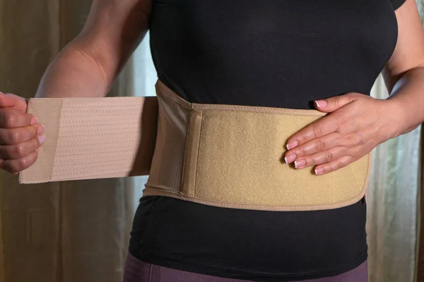 Girl Window Puts Orthopedic Corset Her Lower Back — Stock Photo, Image