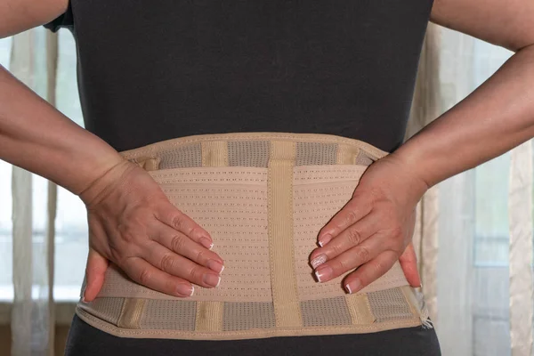 Girl Window Puts Orthopedic Corset Her Lower Back — Stock Photo, Image