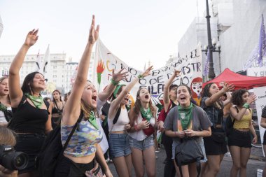 Capital Federal, Buenos Aires / Argentina; Feb 19, 2020: young girls shouting slogans in a demonstration in favor of the approval of the law of legal, safe and free abortion