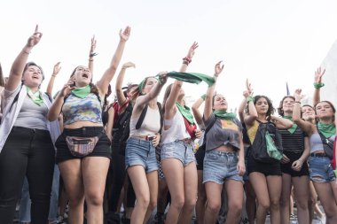 Capital Federal, Buenos Aires / Argentina; Feb 19, 2020: young girls shouting slogans in a rally in favor of the approval of the law of legal, safe and free abortion