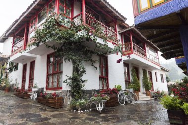Duitama, Boyaca / Colombia; April 9, 2018: Pueblito Boyacense, a picturesque tourist spot with beautiful streets and traditional facades clipart