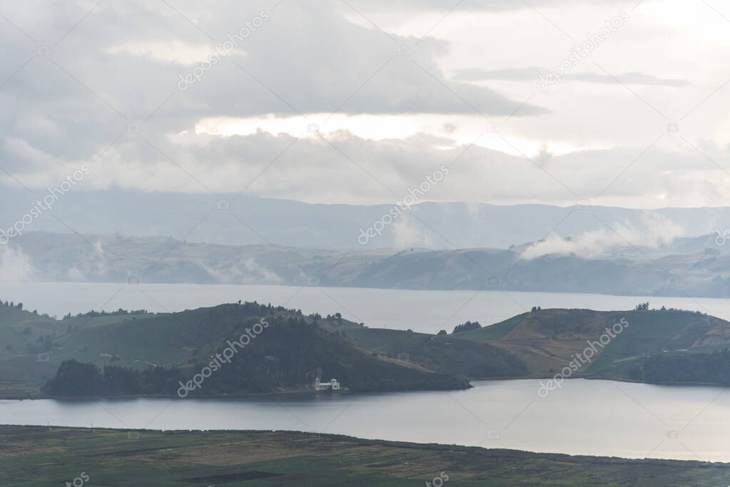Misty Andean landscape: Tota, the largest lake in Colombia, a cold and cloudy day, before the rain
