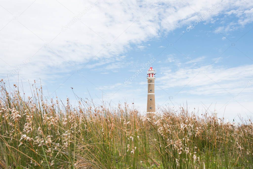 Cabo Polonio Lighthouse and meadow in summer, Rocha, Uruguay; a beautiful tourist destination