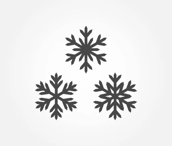 Tre icone dei fiocchi di neve . — Vettoriale Stock
