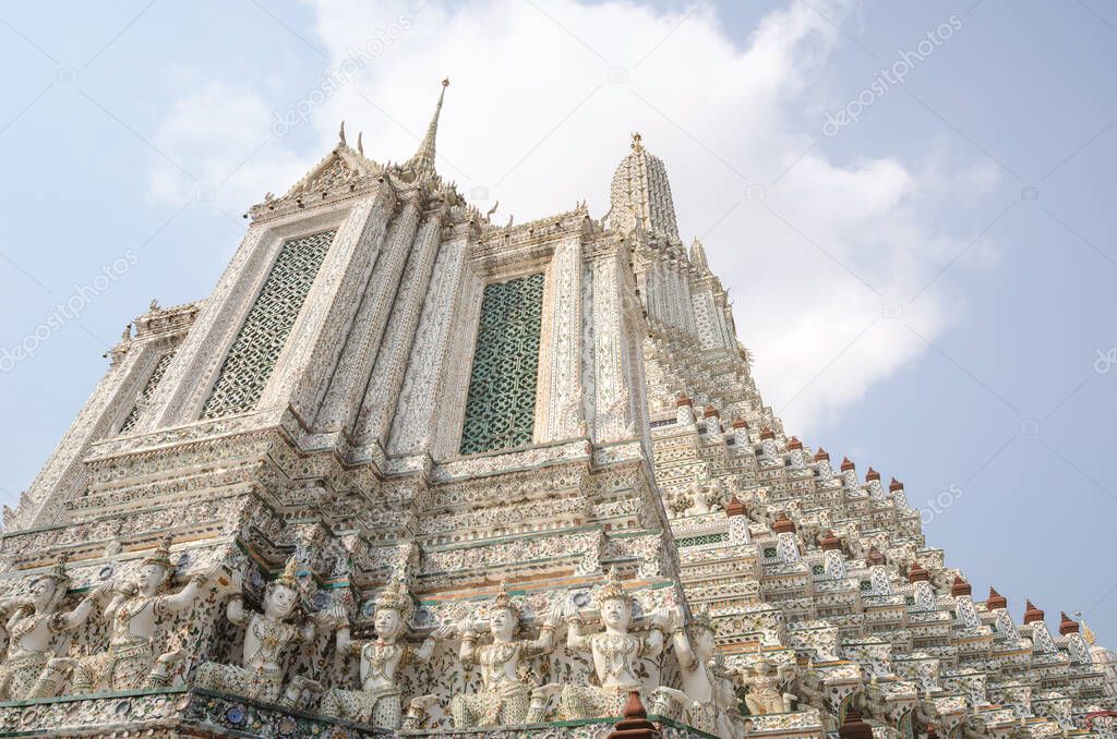 Wat Arun buddhist temple in Bangkok, Thailand on a sunny warm day