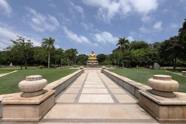 Golden Buddha in the Viharamahadevi Park of Colombo clipart