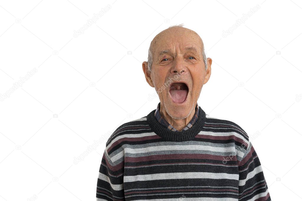 Handsome old man in casual clothes showes his mouth without teeth isolated over white background, need a dentist, copyspace