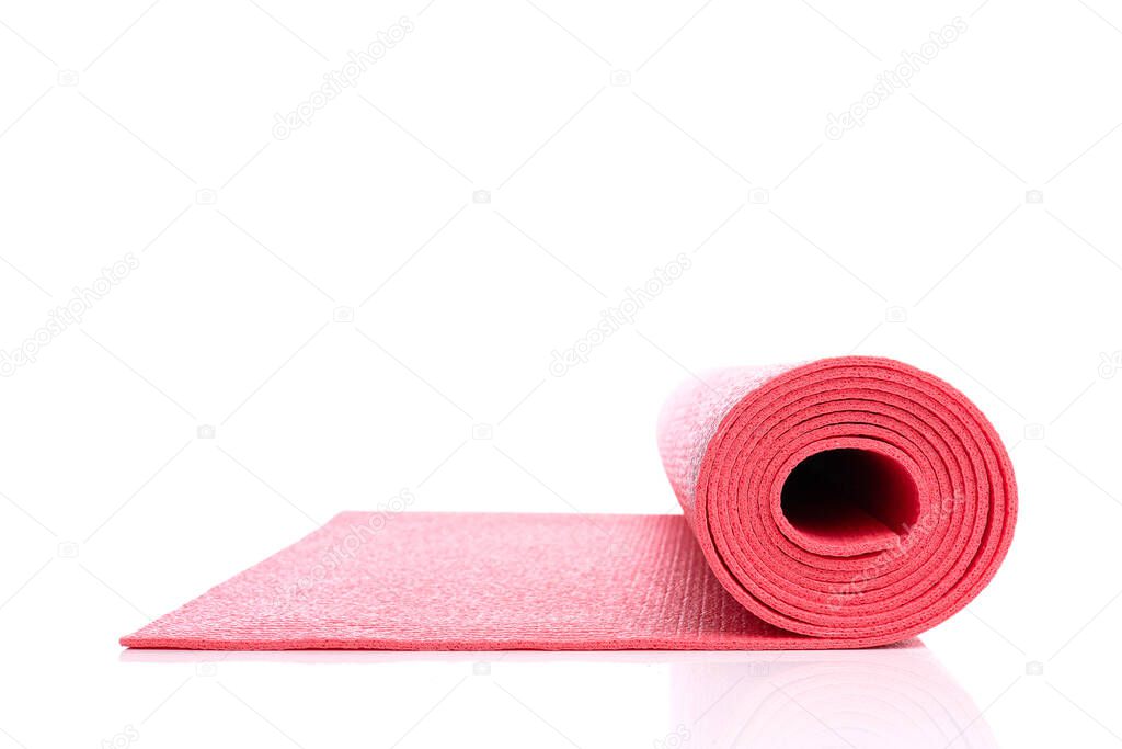 Side view of red open yoga mat for exercise, isolated on white background.