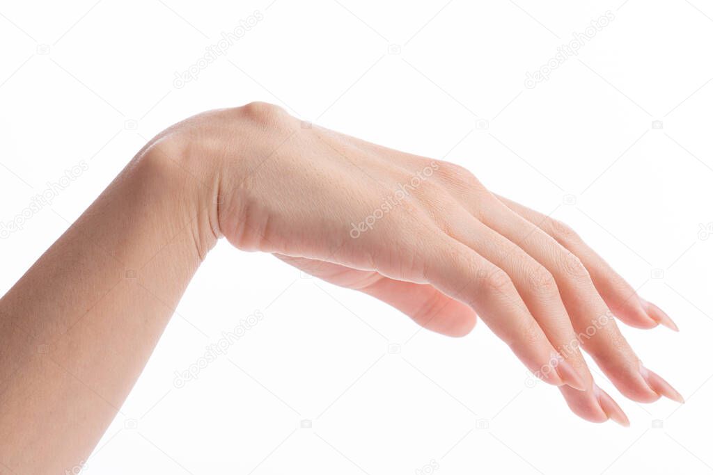 Girls hand with big cyst hygroma isolated on white