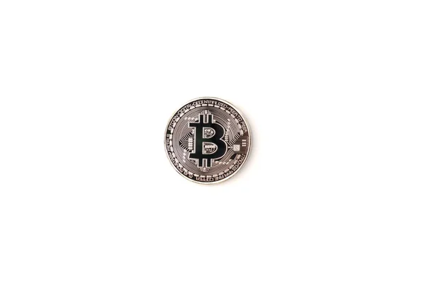 Stříbrný bitcoin se světlem provedeno izolované na bílém pozadí — Stock fotografie