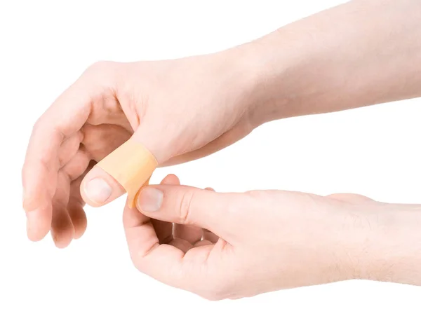 Klebeverband am Finger Stockbild