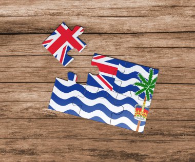 Yapboz üzerinde İngiliz Hint Okyanusu Ulusal Bayrağı. Bir parçası eksik. Tehlike kavramı.