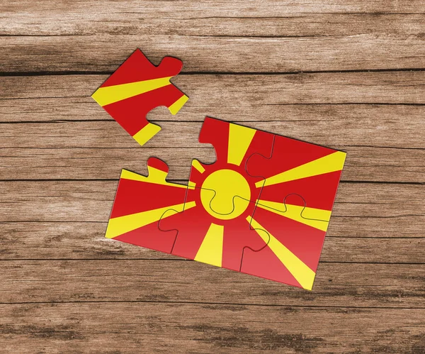 ジグソーパズルのマケドニア国旗 １つ足りない 危険概念 — ストック写真