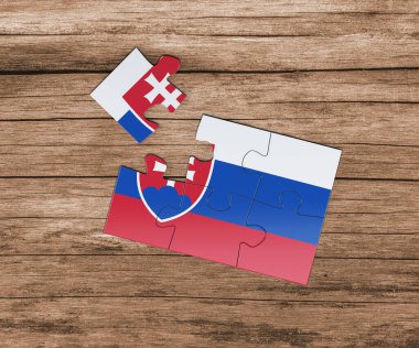 Yapboz üzerinde Slovakya ulusal bayrağı. Bir parçası eksik. Tehlike kavramı.