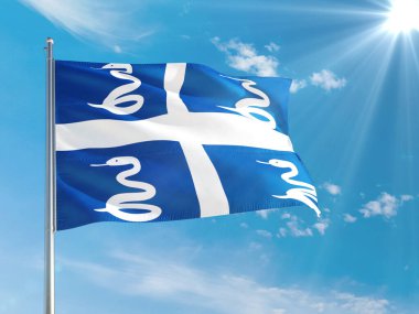 Martinique ulusal bayrağı derin mavi gökyüzüne karşı rüzgarda dalgalanıyor. Kaliteli kumaş. Uluslararası ilişkiler kavramı.