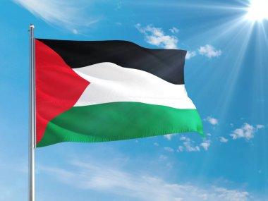 Filistin ulusal bayrağı derin mavi gökyüzüne karşı rüzgarda dalgalanıyor. Kaliteli kumaş. Uluslararası ilişkiler kavramı.