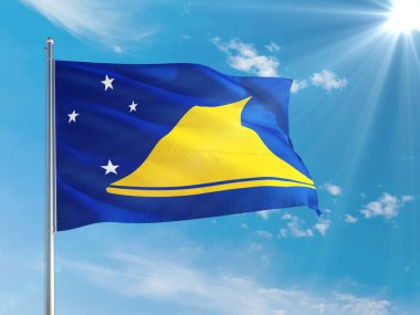 Tokelau ulusal bayrağı derin mavi gökyüzüne karşı rüzgarda dalgalanıyor. Kaliteli kumaş. Uluslararası ilişkiler kavramı.