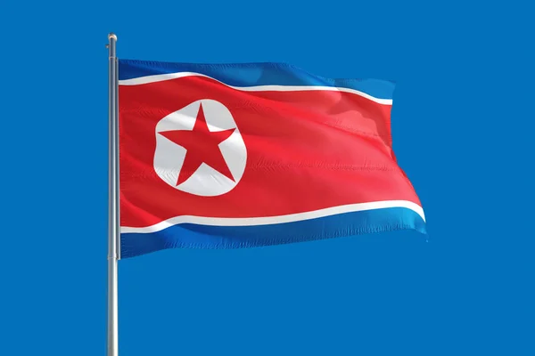 Εθνική Σημαία Της Βόρειας Κορέας Κυματίζει Στον Άνεμο Βαθύ Γαλάζιο — Φωτογραφία Αρχείου